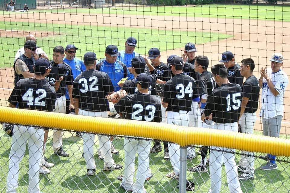 Coaches and players huddle